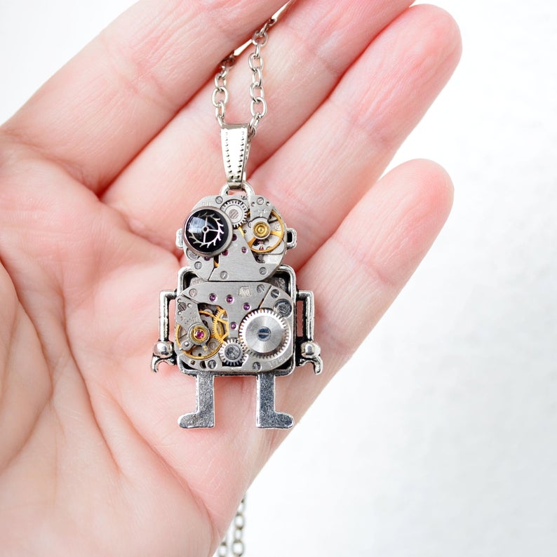 ROBOT S ČERNÝM OKEM - PŘIVĚSEK Z HODINEK II