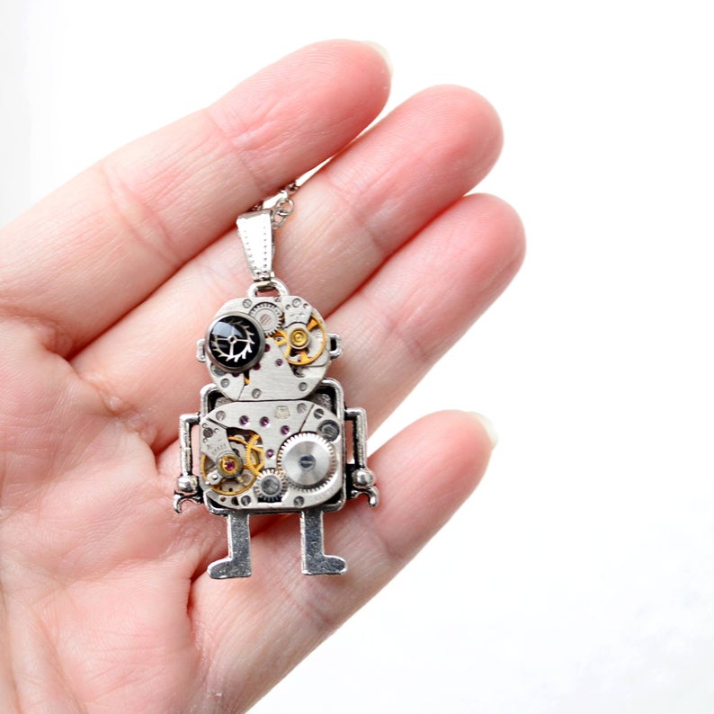 ROBOT S ČERNÝM OKEM - PŘIVĚSEK Z HODINEK II